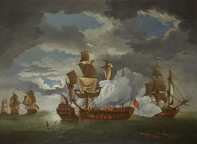 An 18th-century oil painting depicting a dramatic night naval battle between sailing warships. Billowing clouds of dark smoke and bright orange fire engulf the center vessels as they engage in close-quarters combat on a dark, choppy sea under a moonlit sky.